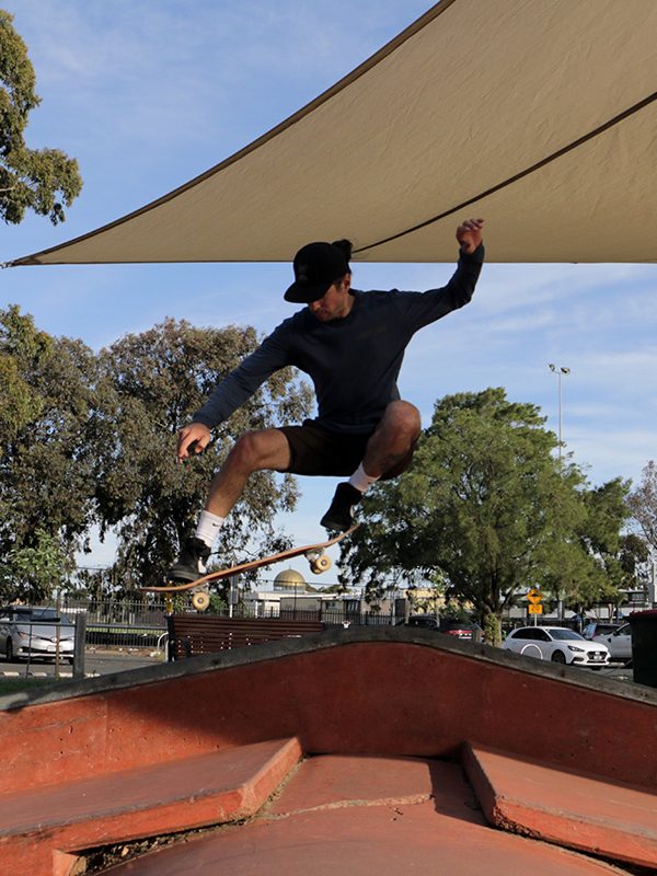 Learning to ollie over a ramp with Skate Up skateboarding lessons